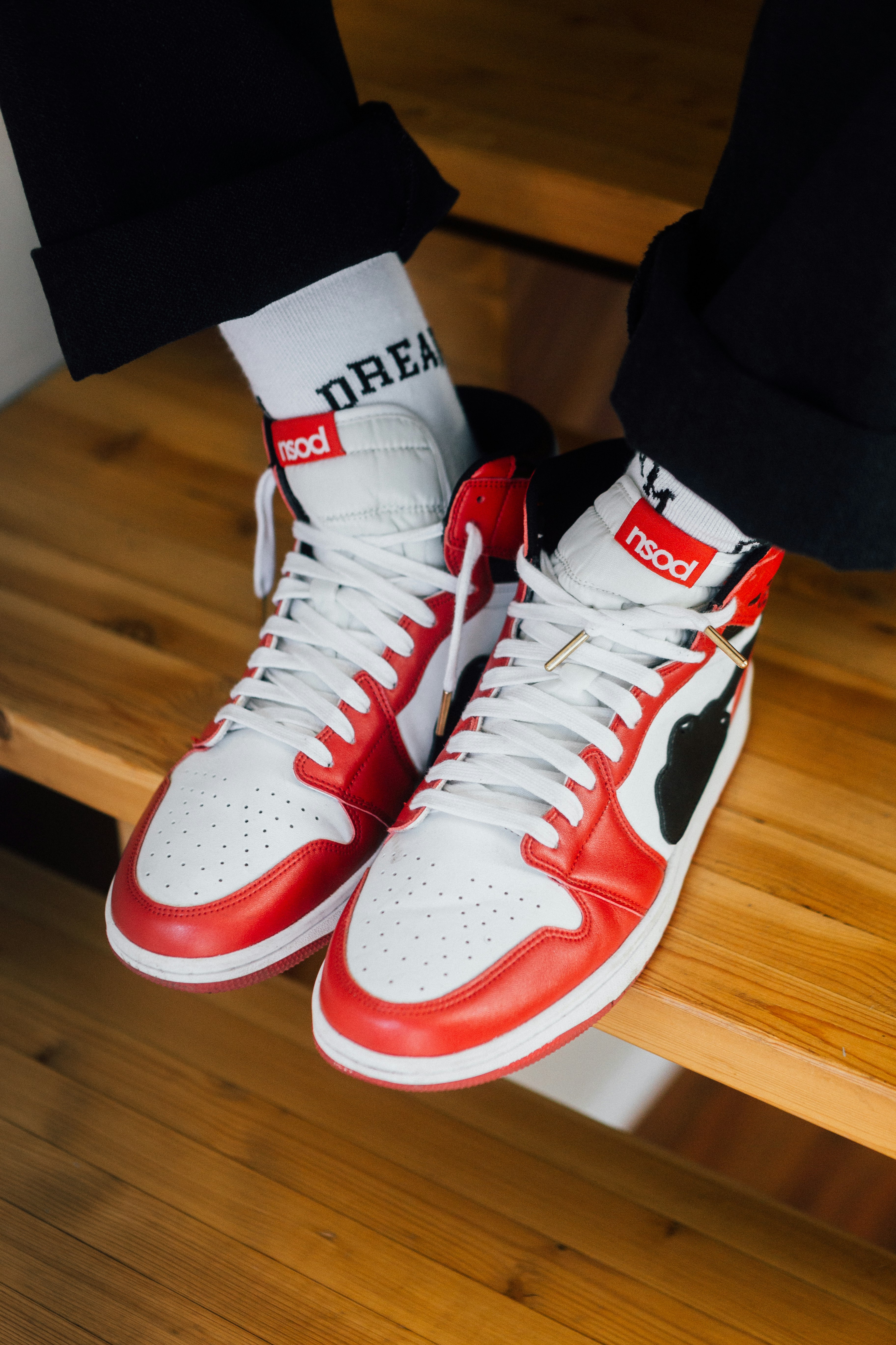red and white nike high top sneakers